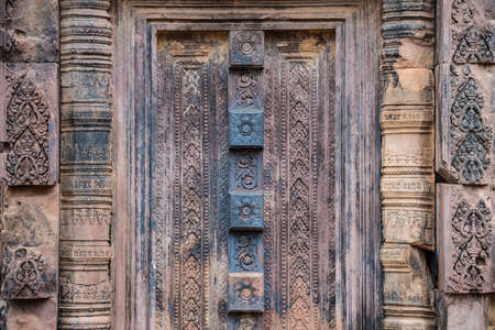 The detail of Banteay Srei the most beautiful pink sandstone temple of Siem Reap, Cambodia.の写真素材