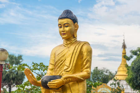The Buddha statue in Burma style in Bago town of Myanmar. Buddha statues are the representations of Lord Buddha himself.のeditorial素材