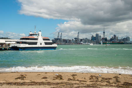 Auckland cityscape view from Devonport Wharf.