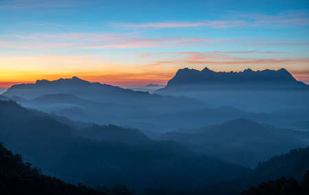 Spectacular view of Doi Luang Chiang Dao mountain in Chiang Mai province of Thailand at dawn. Doi Luang Chiang Dao mountain is the 3rd highest mountains of Thailand.の写真素材