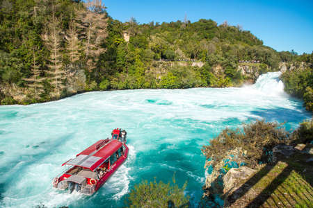 Taupo, New Zealand - April 26 2017: Tourist adventure in Huka Falls with Huka falls river cruise in Taupo, New Zealand.のeditorial素材