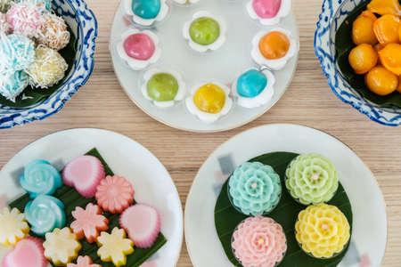 Close up of a set of Thai sweet dessert (Khanom Wan Thai) on the table. Thai desserts are a sweet...