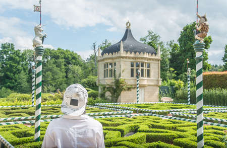 Hamilton, New Zealand - December 08 2017 : Tourist visiting Tudor garden mythical beasts in Hamilton...