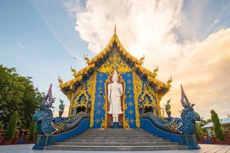 The beautiful Buddhist viharn of Wat Rong Suea Ten temple in Chiang Rai province of Thailand. The temple is a fascinating fusion of traditional Buddhist values and classic Thai architecture.の写真素材