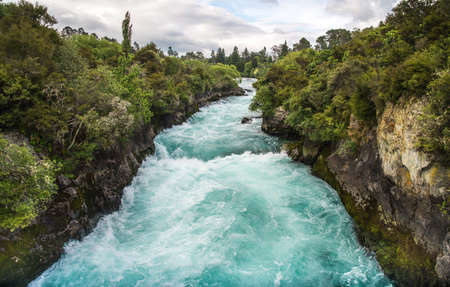 The upstream of Huka falls an iconic tourist most natural attraction place in Taupo, New Zealand. View from pedestrian bridge.の写真素材