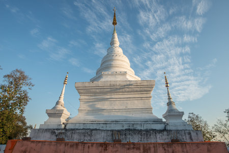 The white pagoda at Wat Phra That Khao Noi in Nan province of the northern Thailand in the morning.の写真素材
