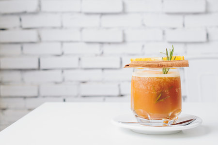 The passion fruit Mocktail serving on white table with isolated white background.の写真素材