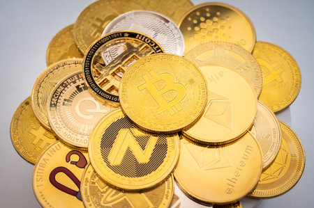 Close up of various kinds of cryptocurrency token coins. Cryptocurrency is a digital or virtual...