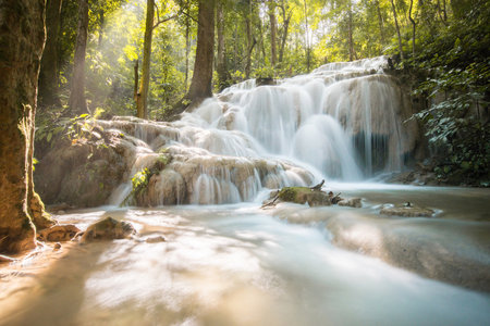 Pu Kaeng waterfall the most beautiful limestone waterfall in Chiang Rai province of Thailand. Tranquility view of the nature in rural area of Northern Thailand.の写真素材
