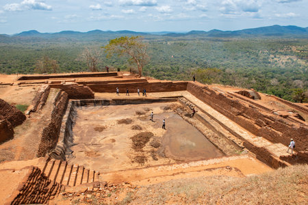 Sigiriya, Sri Lanka : August-07-2019 : Tourist visiting the abandoned palace of King Kashyapa located on the top of Sigiriya an ancient rock fortress and famous UNESCO heritage sitのeditorial素材