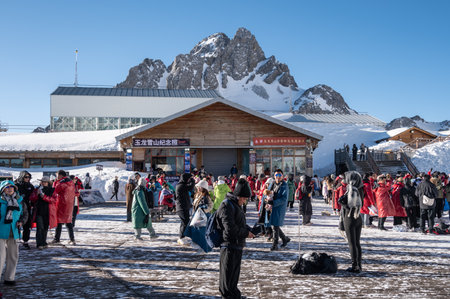 Lijiang, China : March-23-2024 : Crowd of tourist visiting Jade dragon snow mountain in Lijiang, in Yunnan province, China.のeditorial素材