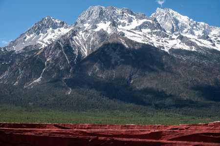 Beautiful view of Jade Dragon Snow Mountain (or Mt.Yulong) seen from Jade Dragon Snow Mountain Scenic Area of Lijiang, in Yunnan province, China.の写真素材
