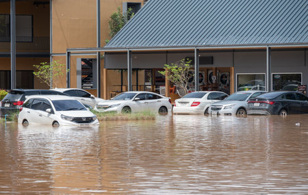 Chiang Rai, Thailand : 12-September-2024 : Cars caught in flooded water after typhoon Yagi has swept Chiang Rai province of Thailand.のeditorial素材