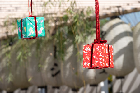 Paper gift box hanging and decorated during Christmas and New Year festival.の写真素材