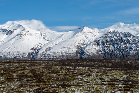 View of HvannadalshnjÃºkur mountain (2,109 m) the highest peak in Iceland (in the right hand side) a dramatic landmark located on the glacier-topped volcano.の写真素材