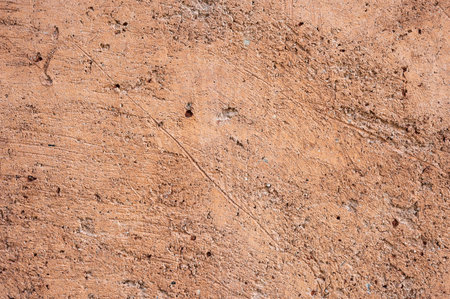 Full frame shot of an earthen wall texture of clay house structure.の写真素材