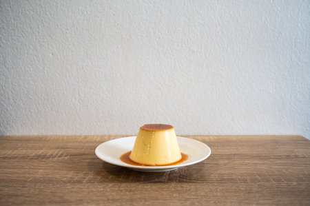 A sweet pudding served on a plate. Pudding is a popular dessert and snack. It tastes sweet, and...