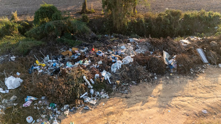 Garbage field (or Landfill) in rural Thailand. It provides a specific place for the disposal of...