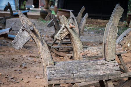Wooden horse (or hobby horse) in the garden. A wooden horse is a child's toy horse.の写真素材