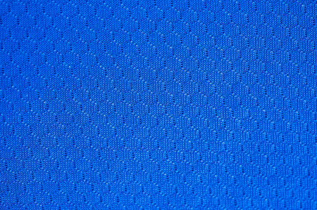 Full frame shot of blue polyester cloth texture and background. This fabric is one of the world's...