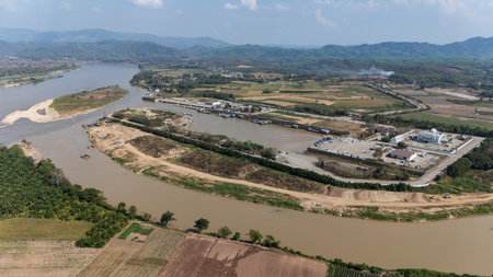 Aerial view of "Sob Kok" ,confluence of Kok river and Mekong Rivers in the Ban Saeo Sub-district, within Chiang Sean District, in Chiang Rai Province, Thailand.の写真素材