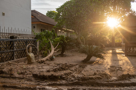 The local angel statue having damaged from mud and water flooding after typhoon Yagi swept across Thailand.の写真素材