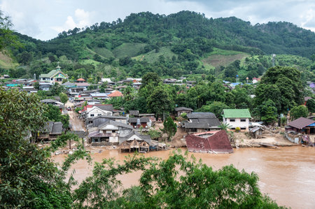 Local houses in Karen village elephant camp in Mae Yao district destroyed after Typhoon Yagi has swept Chiang Rai province of Thailand.の写真素材