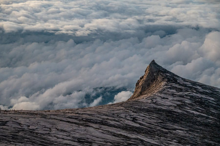 Scenery view of an iconic peak named South Peak on Mt.Kinabalu, Malaysia before sunrise. Mount Kinabalu is the tallest mountain in Malaysia and Borneo.の写真素材