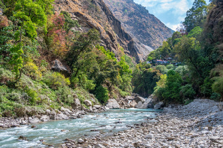 Local Nepali village situated on small hill with beautiful view of Langtang Khola river a river...