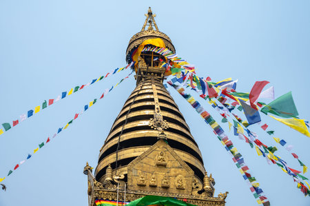 The tiered umbrella of Swayambhunath stupa in Nepal. Swayambhunath is one of the most sacred...