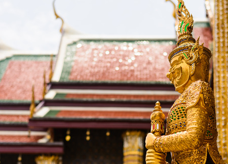 Giant sculpture in Wat Phra Kaew Temple, Thailand. On an old paper.の写真素材