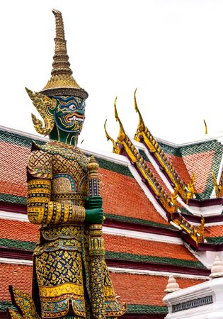 Giant sculpture in Wat Phra Kaew Temple, Thailand. On an old paper.の写真素材