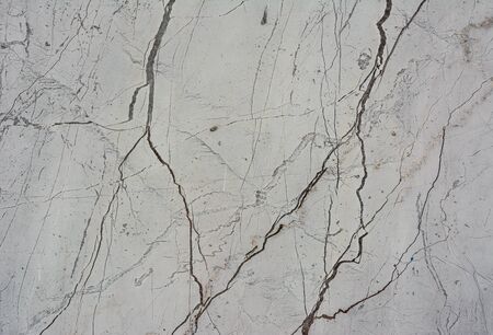 Grunge concrete cement wall with crack in industrial building, great for your design and texture backgroundの写真素材