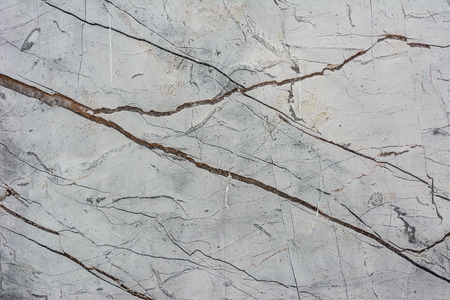 Grunge concrete cement wall with crack in industrial building, great for your design and texture backgroundの写真素材