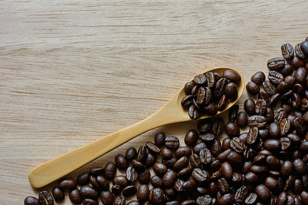 brown coffee, brown coffee and spoon on wooden backgroundの写真素材