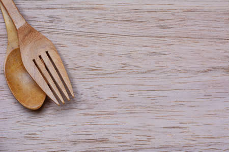 forx and spoon on wooden top viewの写真素材
