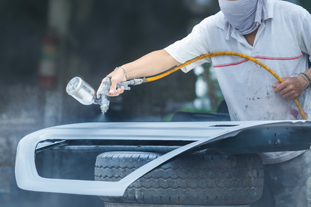 Spray paint car mechanic,Car sprayer,paint repair work.の写真素材