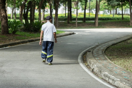 Old man Exercising in the park,jogging and running outdoors in nature,jogging workout wellness concept,old people.の写真素材