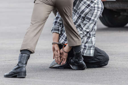 police helped to catch the guilty and lock the handcuffs,arrested.