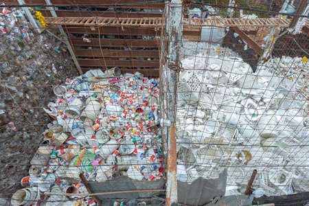 Lampang, Thailand June 8-2020 Waste sorting factory and buy antiques, recycle and store waste plastic bottles, paper, aluminum cans to reduce global warming,motion blur,overuse of noise reduction.の写真素材