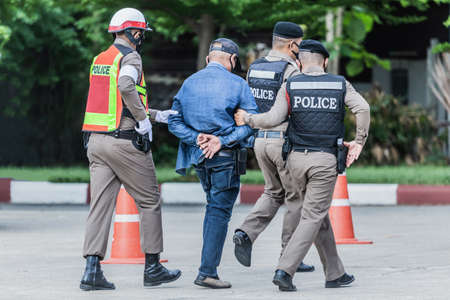 police helped to catch the guilty and lock the handcuffs,arrested.