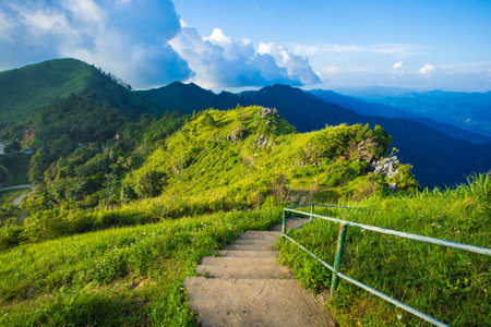 Staircase on mountain at Doi Pha Tang in Chiangrai, Thailandの写真素材