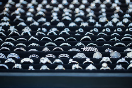 Jewelry on display in a shop,Silver metal jewelryの写真素材