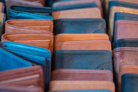Close up of leather wallet for sale in a market, Thailand.の写真素材