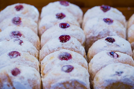 Delicious buns with cherries and powdered sugar. Selective focus,Doughnuts Sold at a Street Market in Thailand, Street Food.の写真素材