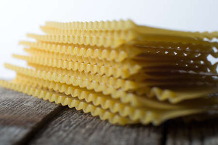 Pasta Lasagna Noodles stack rustic backgroundの写真素材