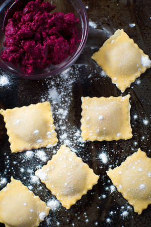 Roasted beet filled ravioli homemade pastaの写真素材
