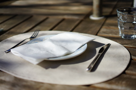 White plate, knife and forkの写真素材