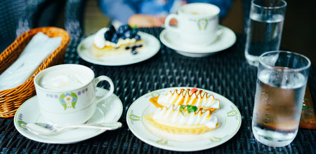 Coffee and cakes on the table. Selective focus at Karuizawaの写真素材