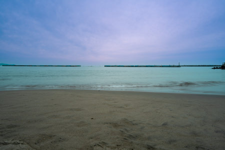 Beautiful tropical beach and sea at twilight time for travel and vacationの写真素材